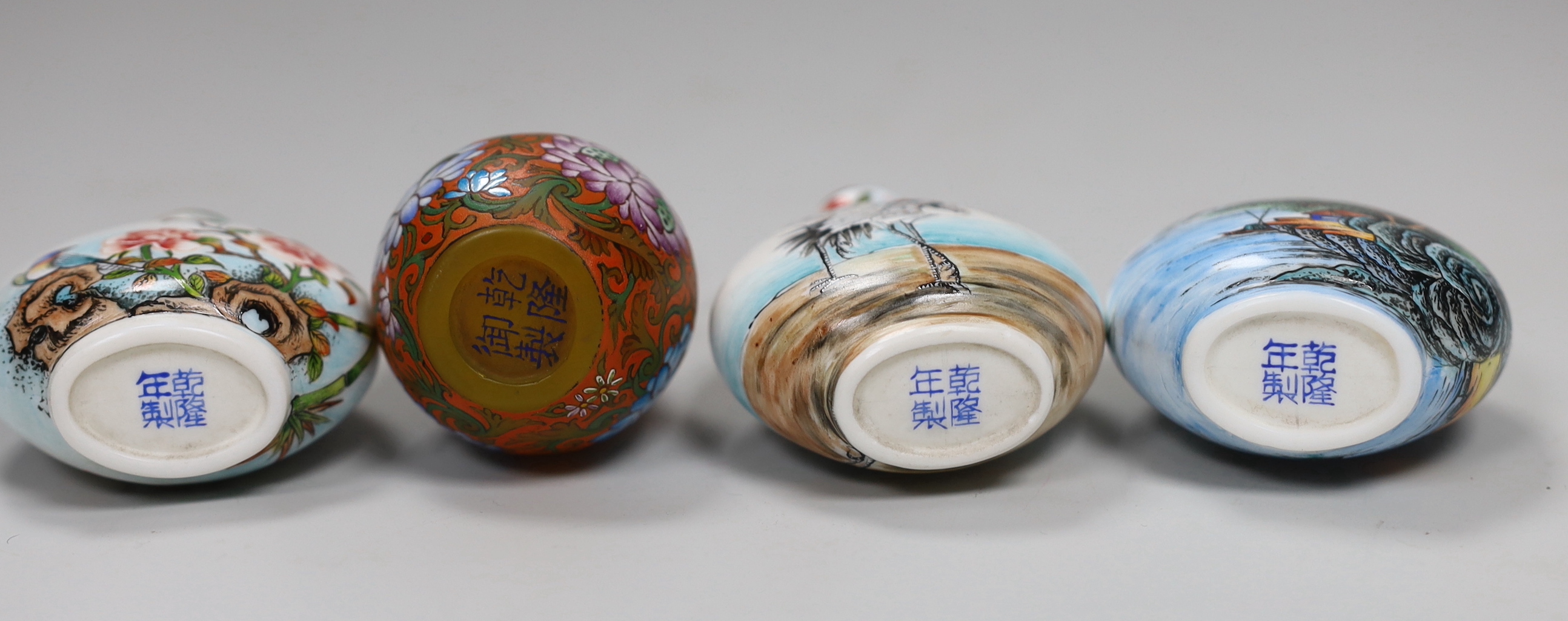 Seven Chinese enamelled glass bottles, tallest 9cm high